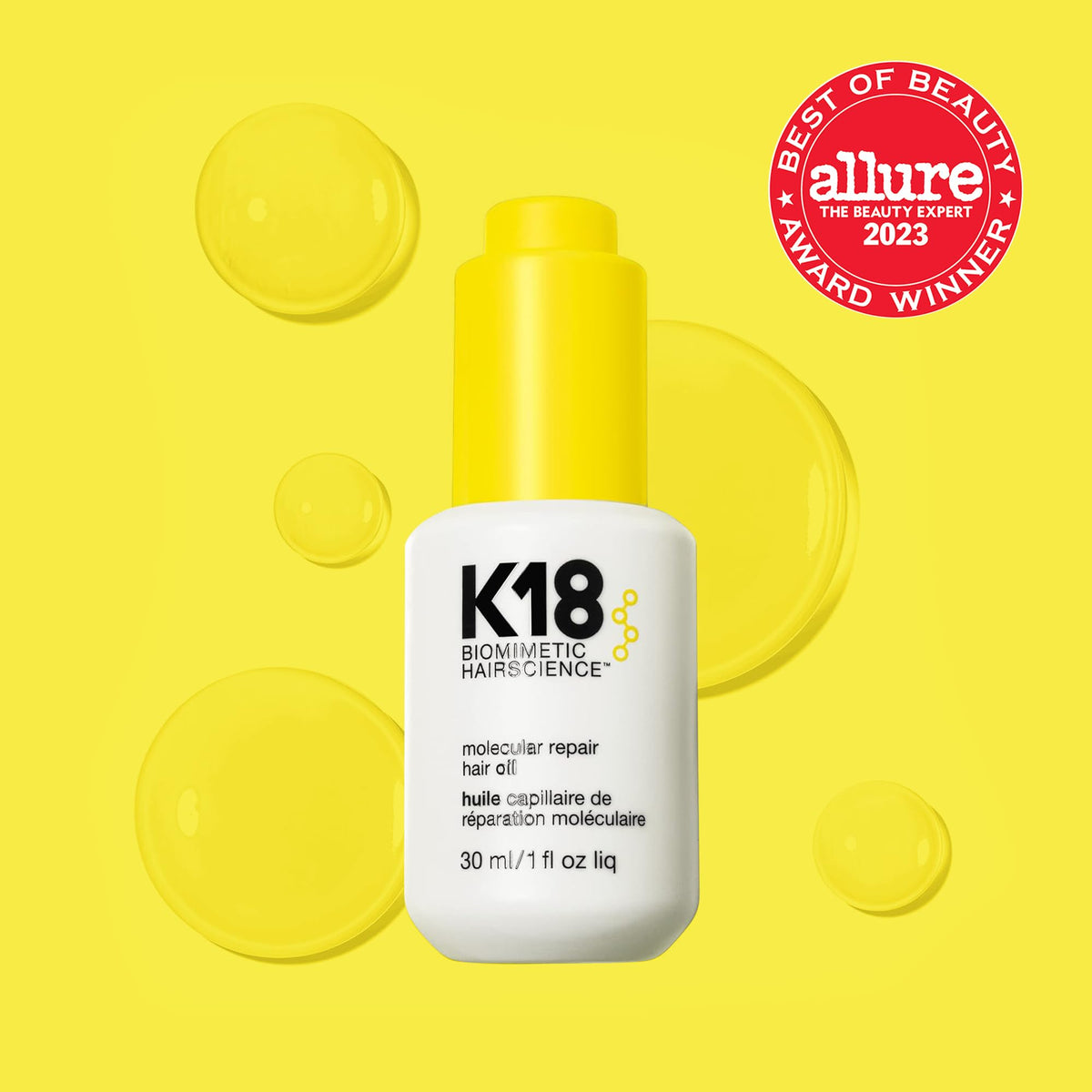 K18 dropper detail dispensing oil, highlighting precise application
