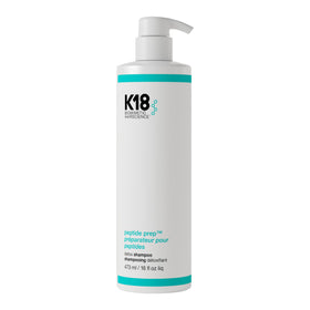 K18 front bottle view showing clean design and volume benefit