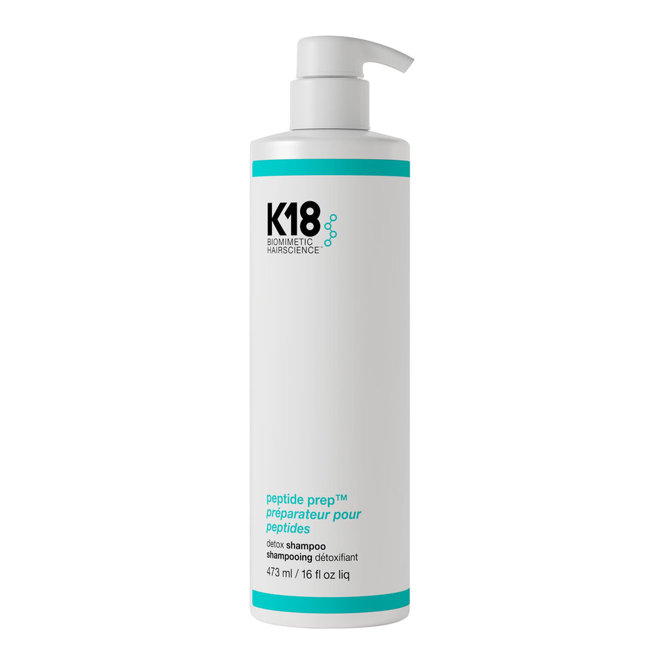 K18 front bottle view showing clean design and volume benefit