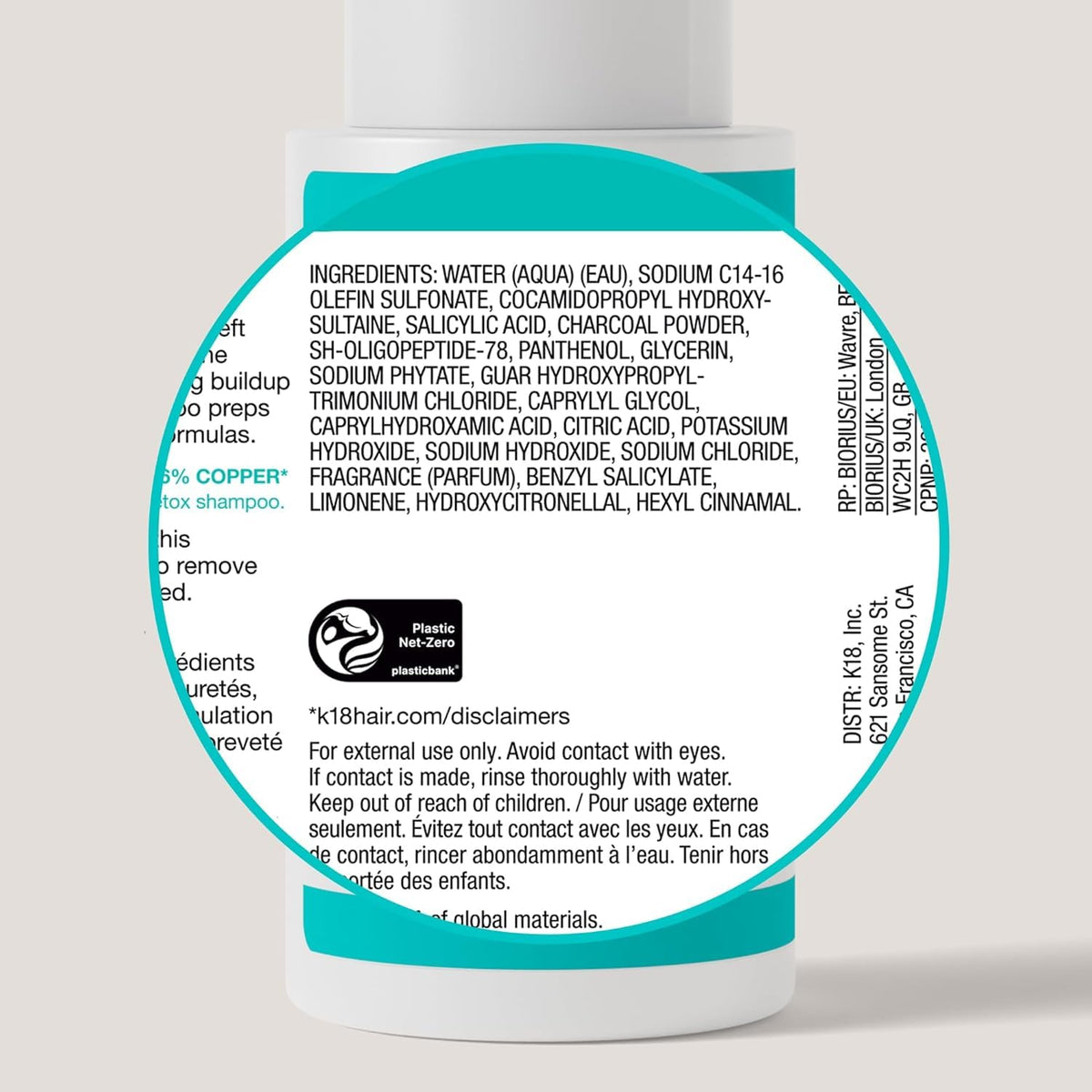K18 product label close-up displaying key actives and benefits