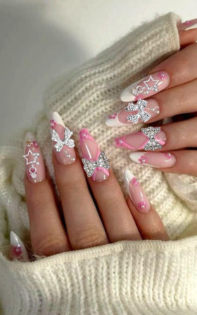 KACHIMOO charms applied on acrylic nail swatch demonstrating finished glam effect