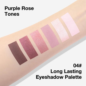 Kaely palette next to coin to show compact size and easy portability