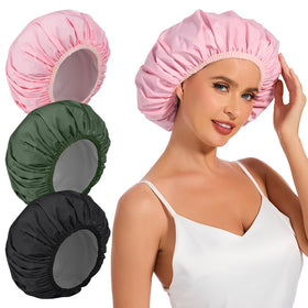 Kafteri front view showing three colorful reusable shower caps and waterproof benefit