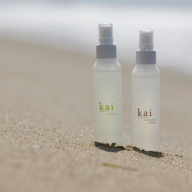 kai body glow size comparison in hand showing portable 4 fl oz benefit