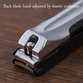 KAI clippers held in hand to show compact size and ergonomic benefit