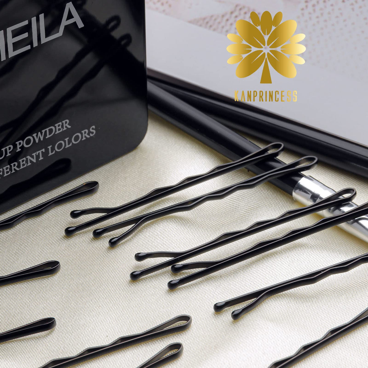 KANPRINCESS pins beside a ruler showing 2-inch length, balanced hold and invisibility