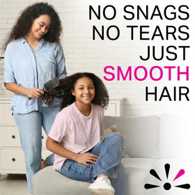 KareCo brush detangling wet hair gently with reduced pulling