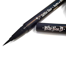 Kat Von D tattoo liner scale comparison in hand for size reference