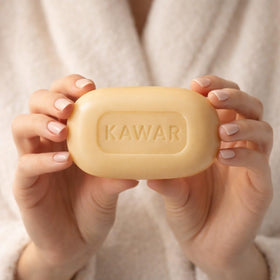 KAWAR soap in hand showing size and travel-friendly convenience