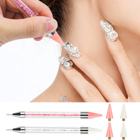 Kaychan pen in use placing a rhinestone for faster, neater nail decorations