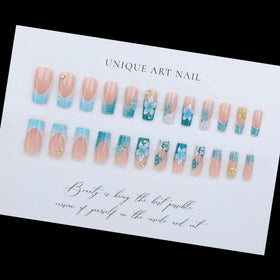 Kcjckcdd hands applying a press-on nail demonstrating quick, secure attachment