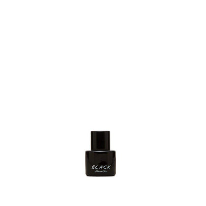 Kenneth Cole black front packaging showing compact travel-size and elegant finish