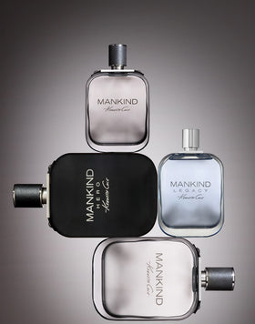 Kenneth Cole Mankind Hero being sprayed onto chest illustrating easy freshening on the go