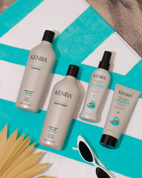 Kenra spray mist in hand demonstrating even lightweight application