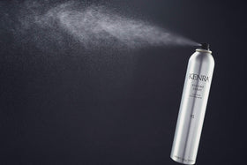 Kenra spray held in hand showing 16 oz scale and salon supply benefit