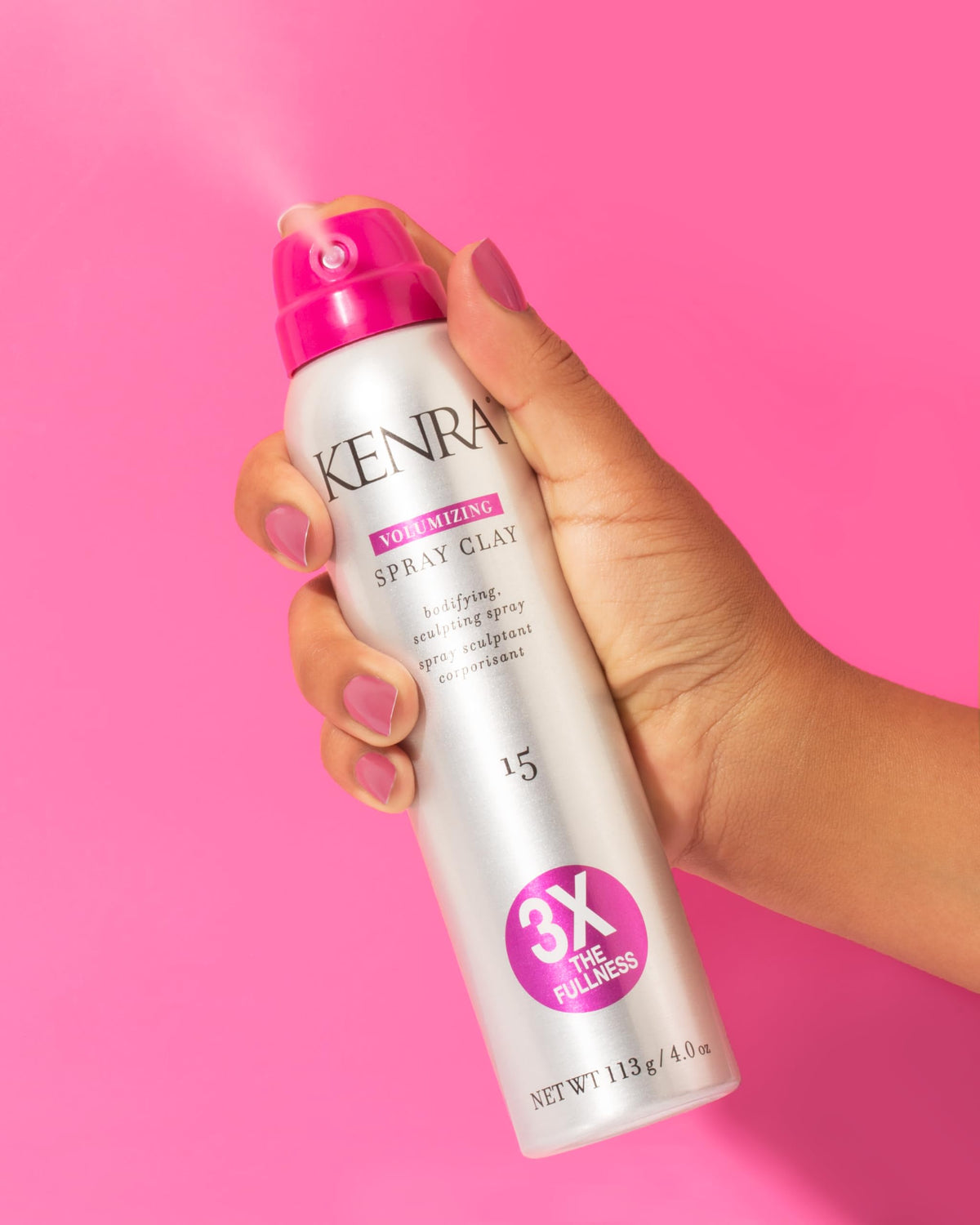 Kenra 4 oz can next to common objects showing compact travel size