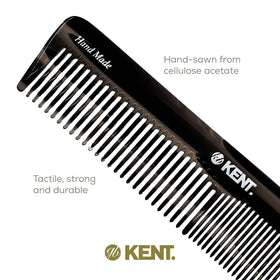 KENT full-length comb held in hand to show scale and ergonomic grip benefit