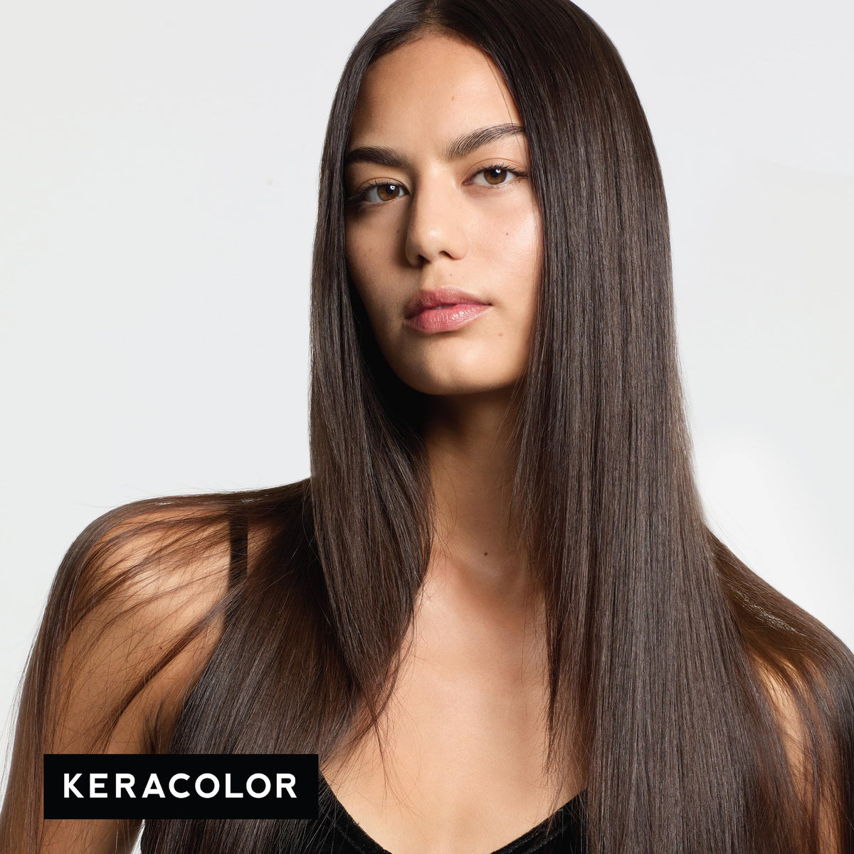KERACOLOR applying Clenditioner on dry hair for intense espresso color payoff benefit