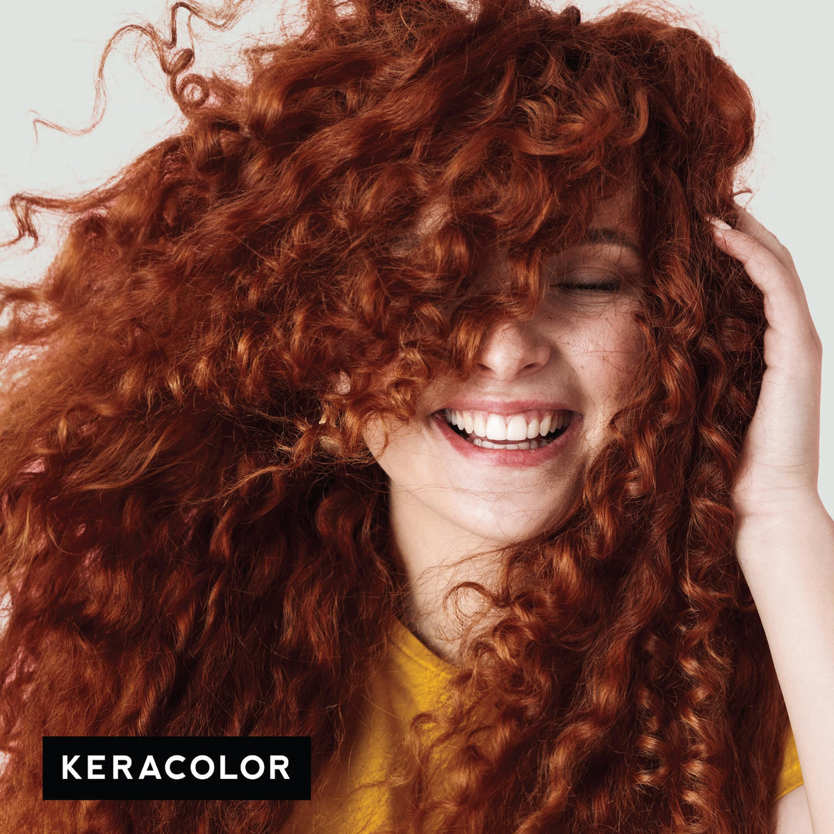 KERACOLOR clenditioner in hand ready to apply for instant color refresh