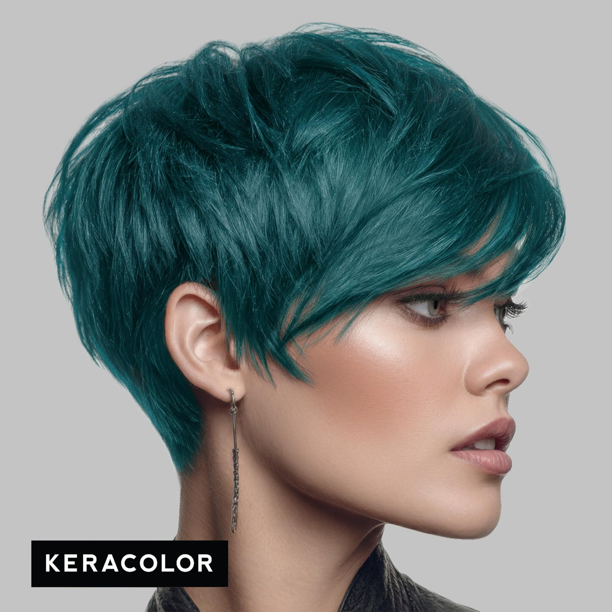 KERACOLOR applying teal clenditioner to wet hair demonstrating easy color deposit