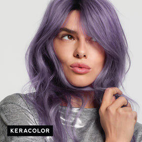 KERACOLOR lavender Clenditioner spread through damp hair to illustrate coverage