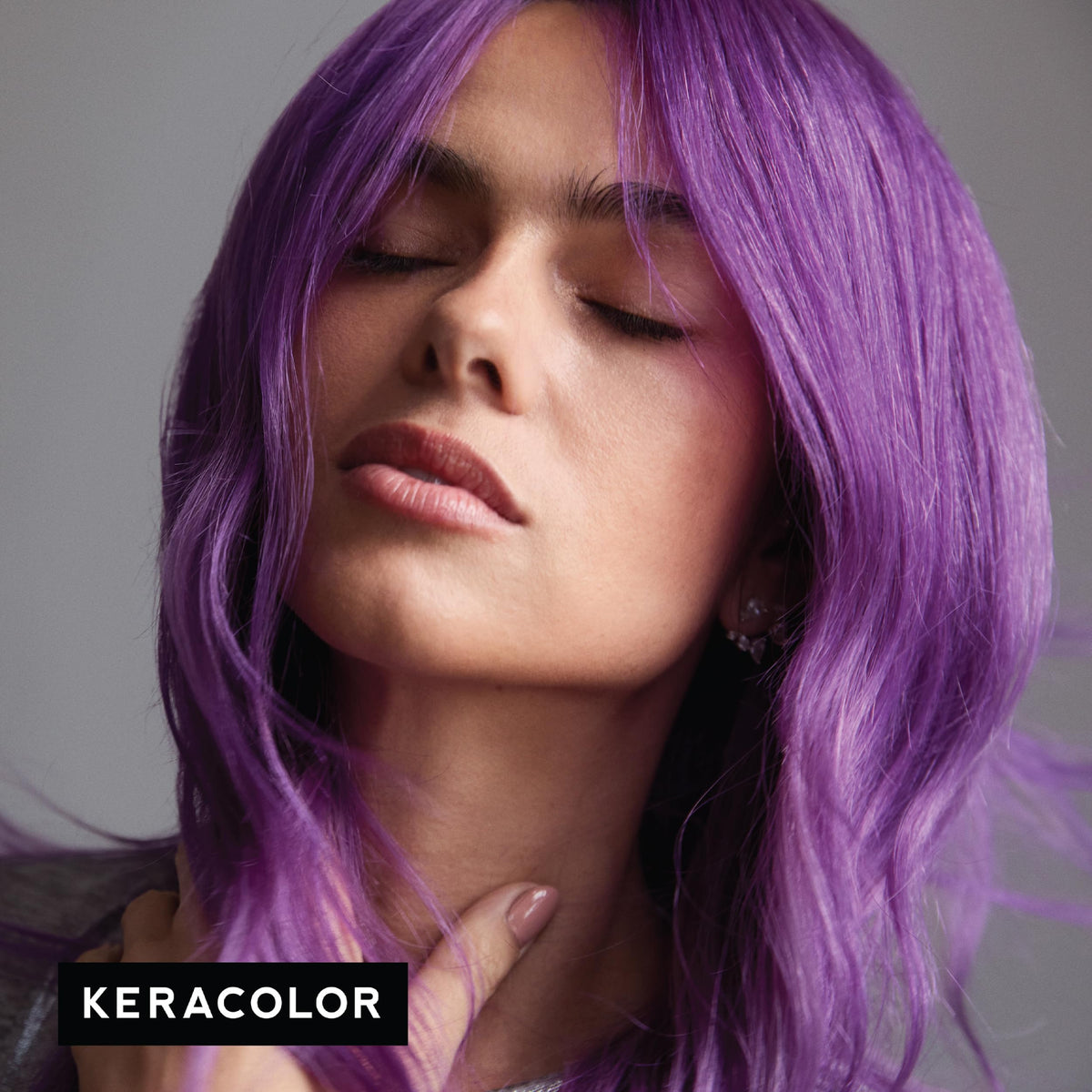 KERACOLOR PURPLE being applied to dry hair for intense color payoff
