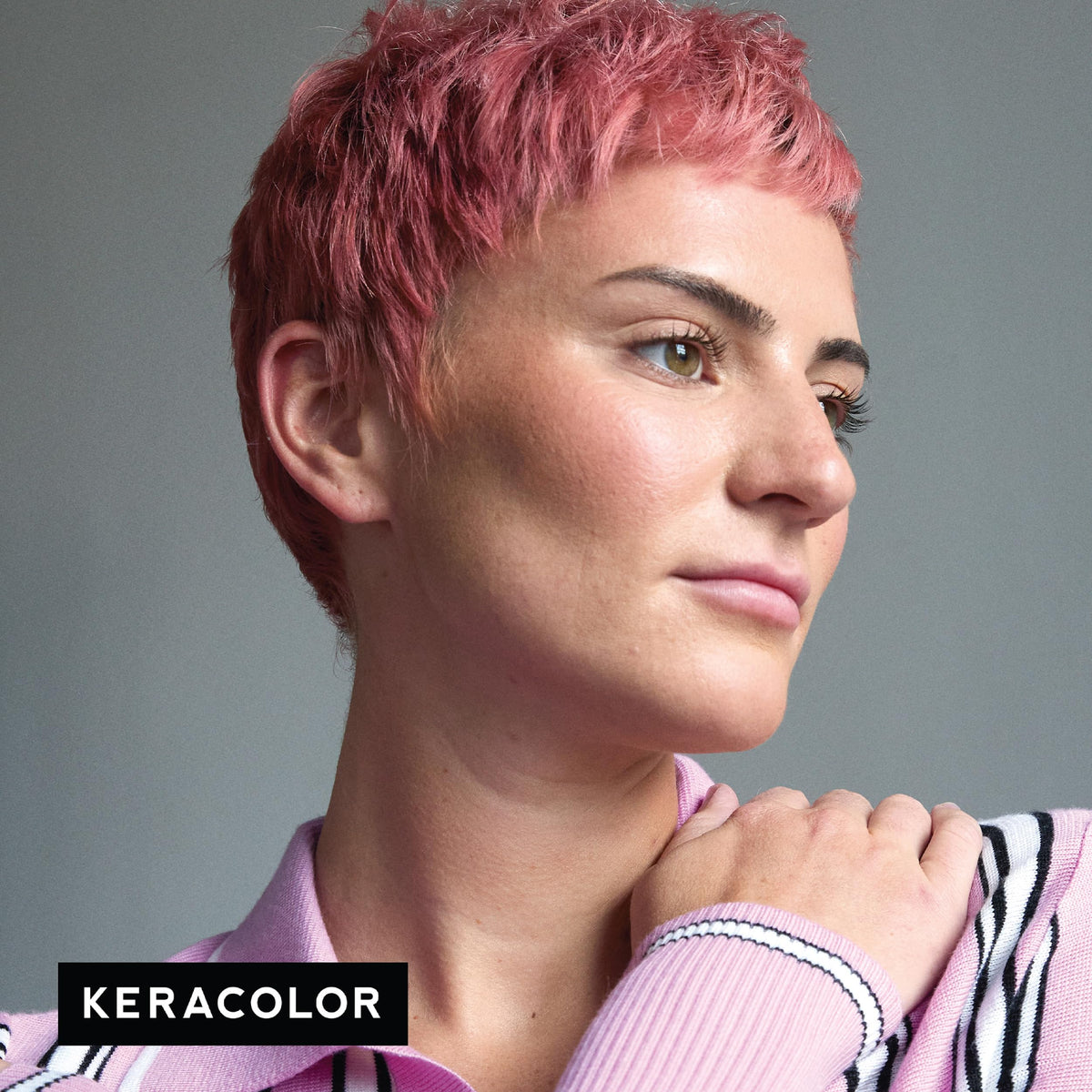 KERACOLOR applying rose-gold Clenditioner to hair for instant tint