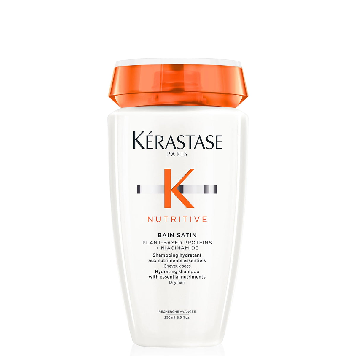 KÉRASTASE bottle front label showing product and benefits