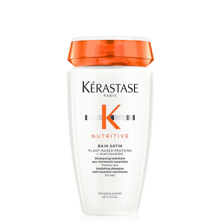 KÉRASTASE bottle front label showing product and benefits