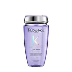 KÉRASTASE bottle front view showing brand and product brightening benefit