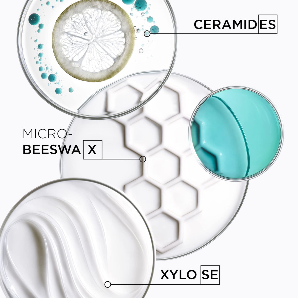 KÉRASTASE in-use image of stylist blow-drying hair showing frizz control and glossy finish
