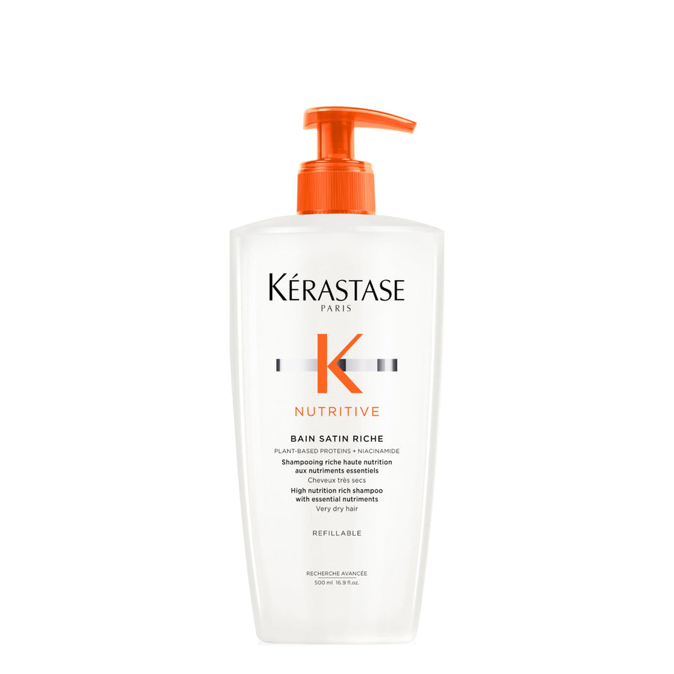 KÉRASTASE front bottle view showing sleek packaging and product benefit