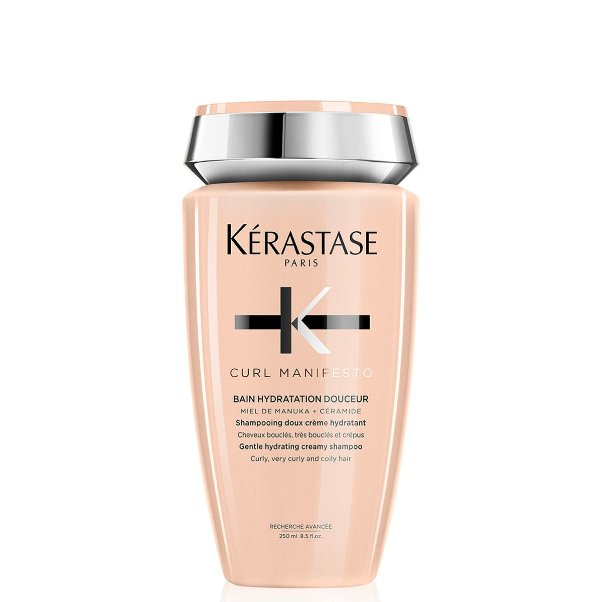 KÉRASTASE front bottle view showing Curl Manifesto benefits and hydrating formula