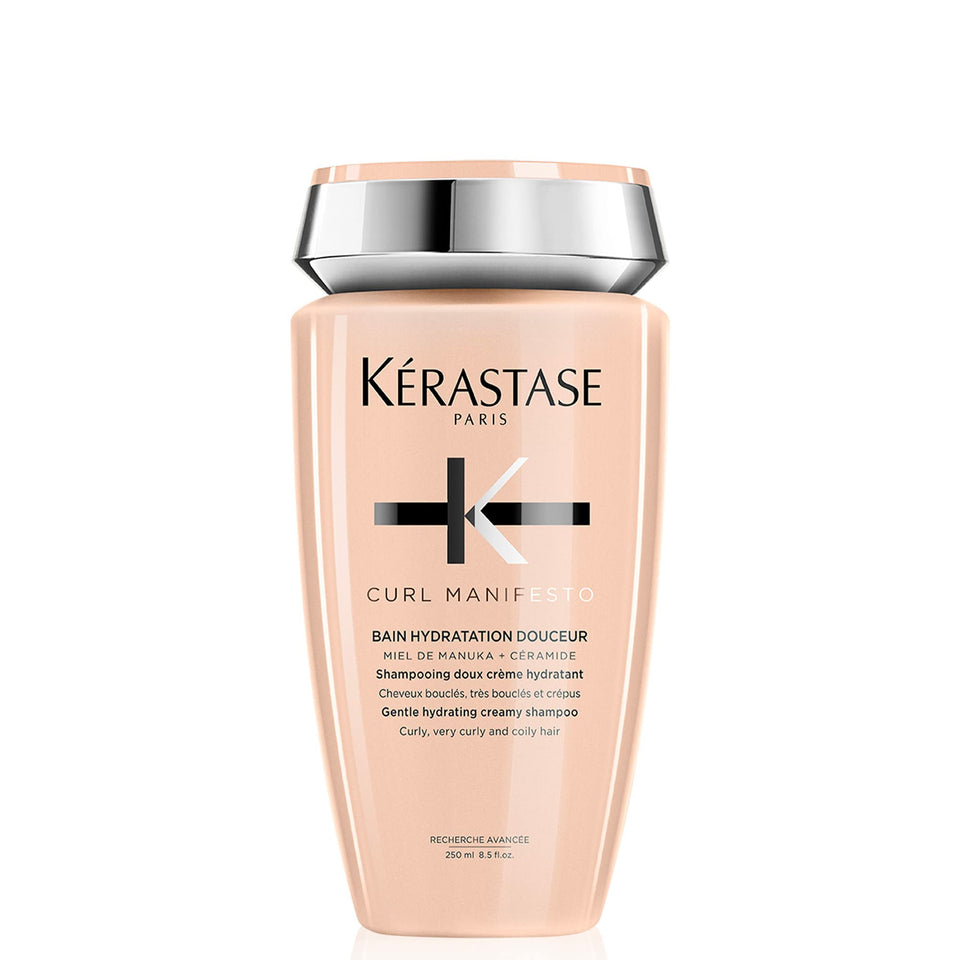 KÉRASTASE front bottle view showing Curl Manifesto benefits and hydrating formula