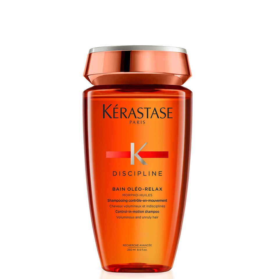 KÉRASTASE Discipline shampoo front bottle shows product clarity and professional branding benefit