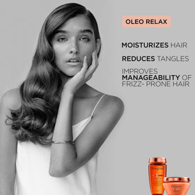 KÉRASTASE Discipline in-shower lather on hair demonstrating gentle cleansing and frizz control benefit