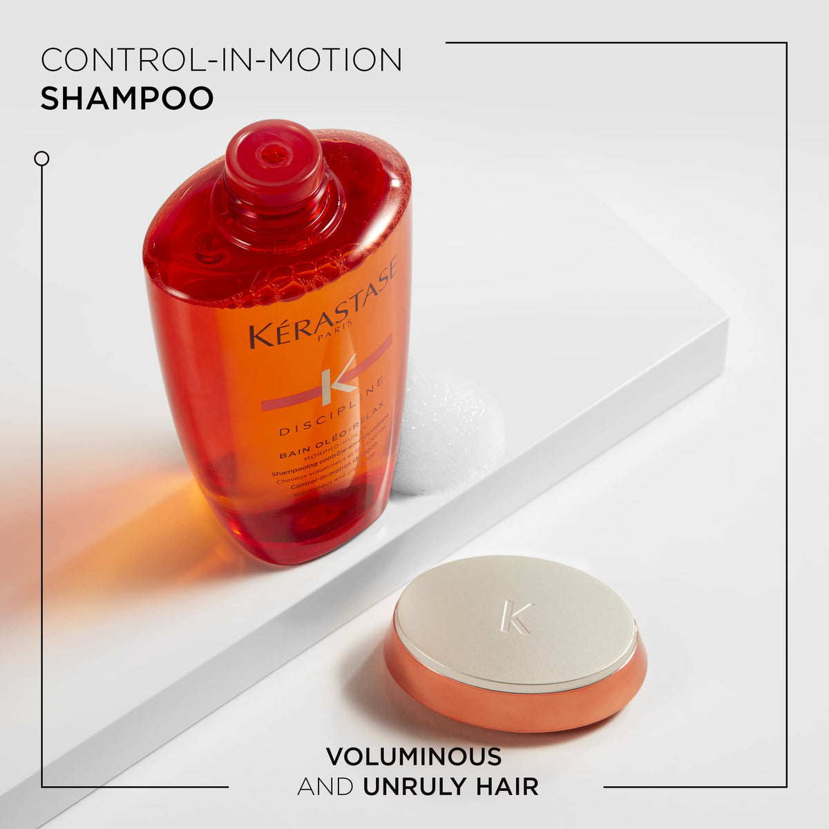 KÉRASTASE Discipline pump close-up highlighting precise dispensing for controlled application benefit