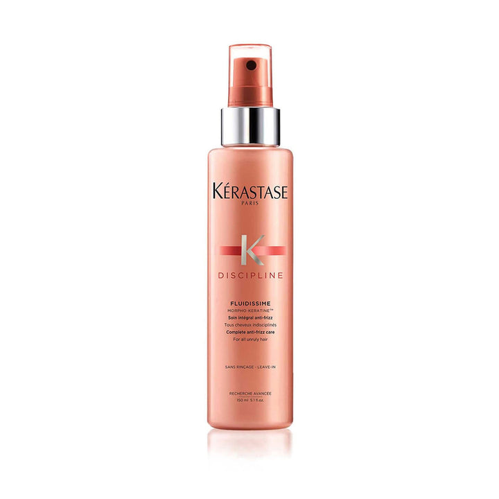 KÉRASTASE bottle front view showing product branding and benefits