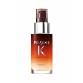 KÉRASTASE front pump bottle showing compact travel-friendly design and easy dosing