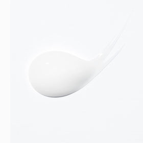 KÉRASTASE ingredient label showing shea butter and hydrating components benefit