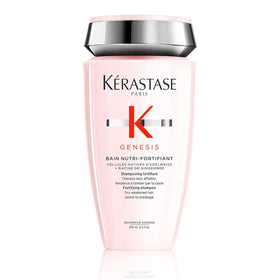 KÉRASTASE bottle front view showing sleek packaging and salon-quality benefit