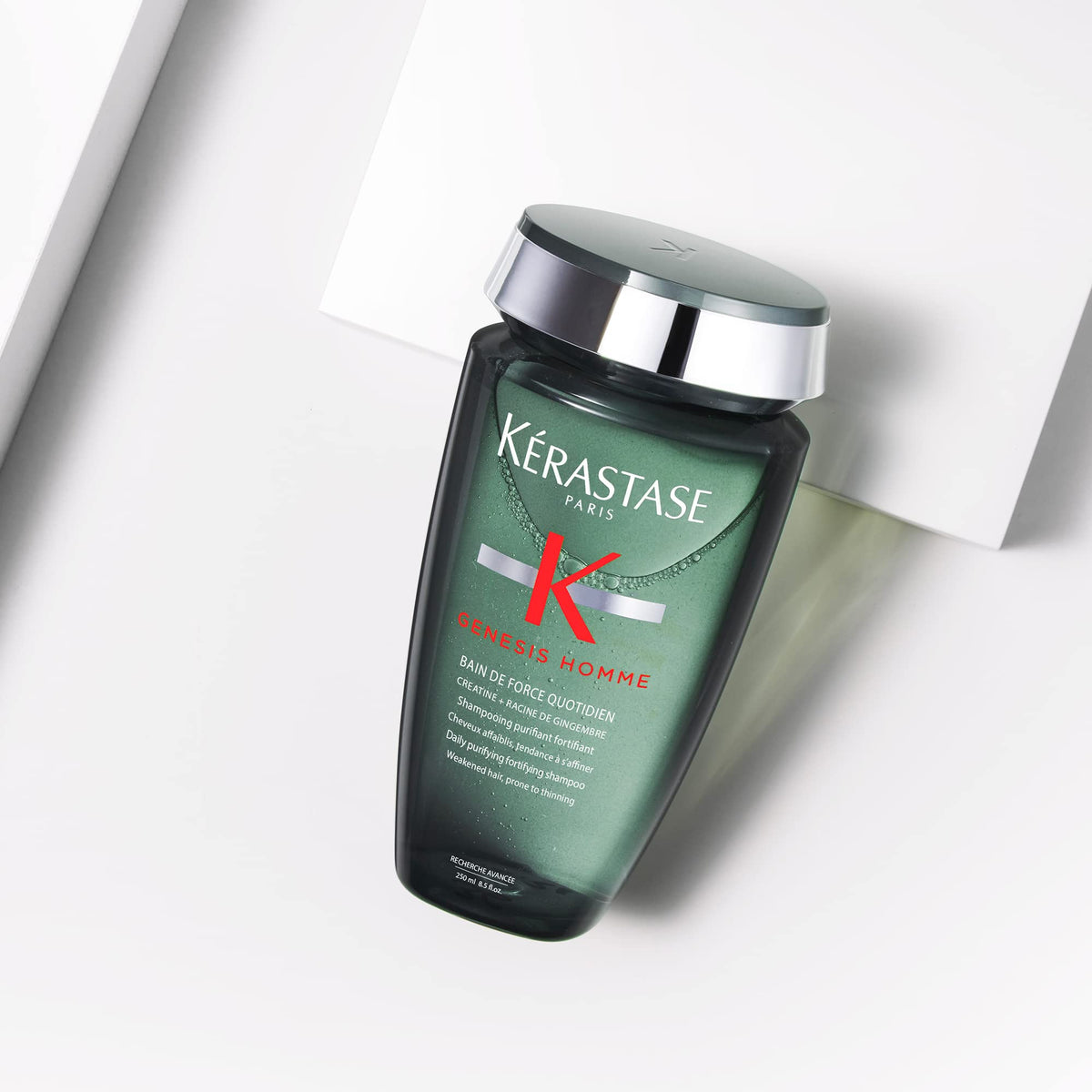 KÉRASTASE ginger root and creatine ingredients visual highlighting strengthening benefit