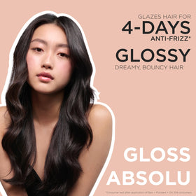 KÉRASTASE glossy finished hair close-up showing smooth shine benefit