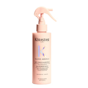 KÉRASTASE bottle front packaging showing product and benefits