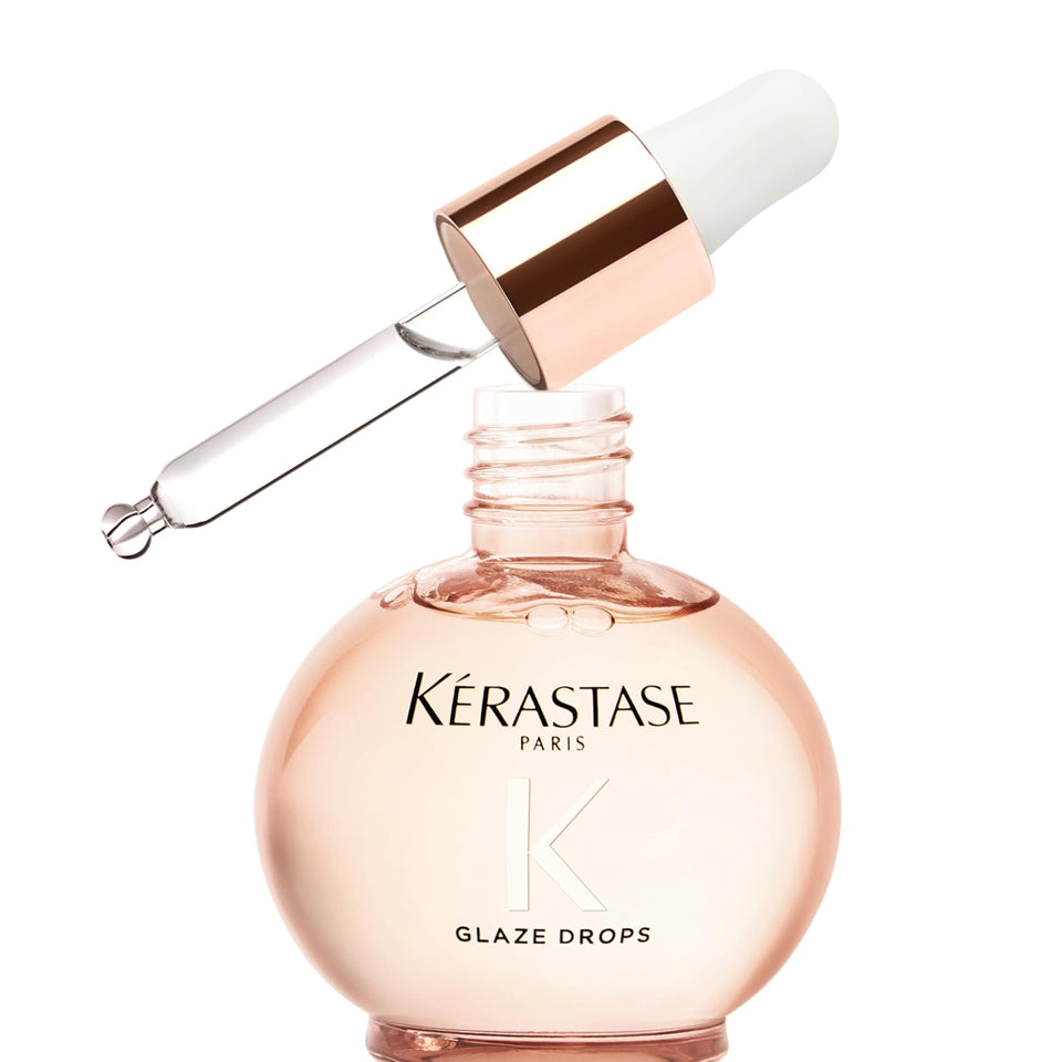 KÉRASTASE bottle front view showing elegant packaging and glossy finish benefit