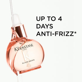 KÉRASTASE on bathroom shelf styled in lifestyle setting suggesting daily ritual benefit