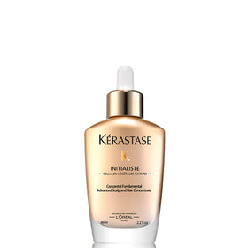 KÉRASTASE front bottle view showing product benefits and elegant packaging