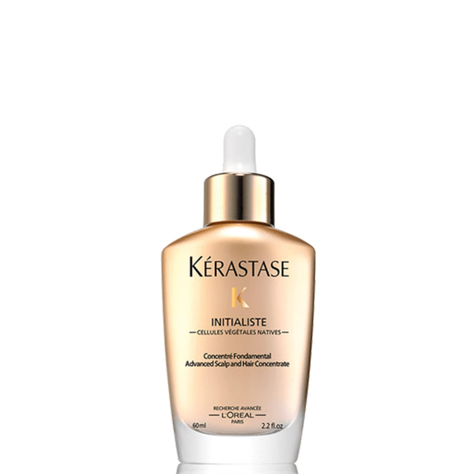 KÉRASTASE front bottle view showing product benefits and elegant packaging