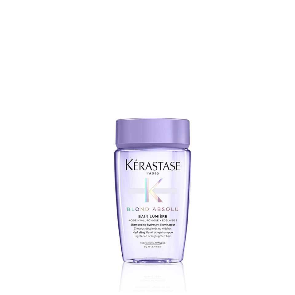 KÉRASTASE front packaging travel-size bottle showing brand and product benefits