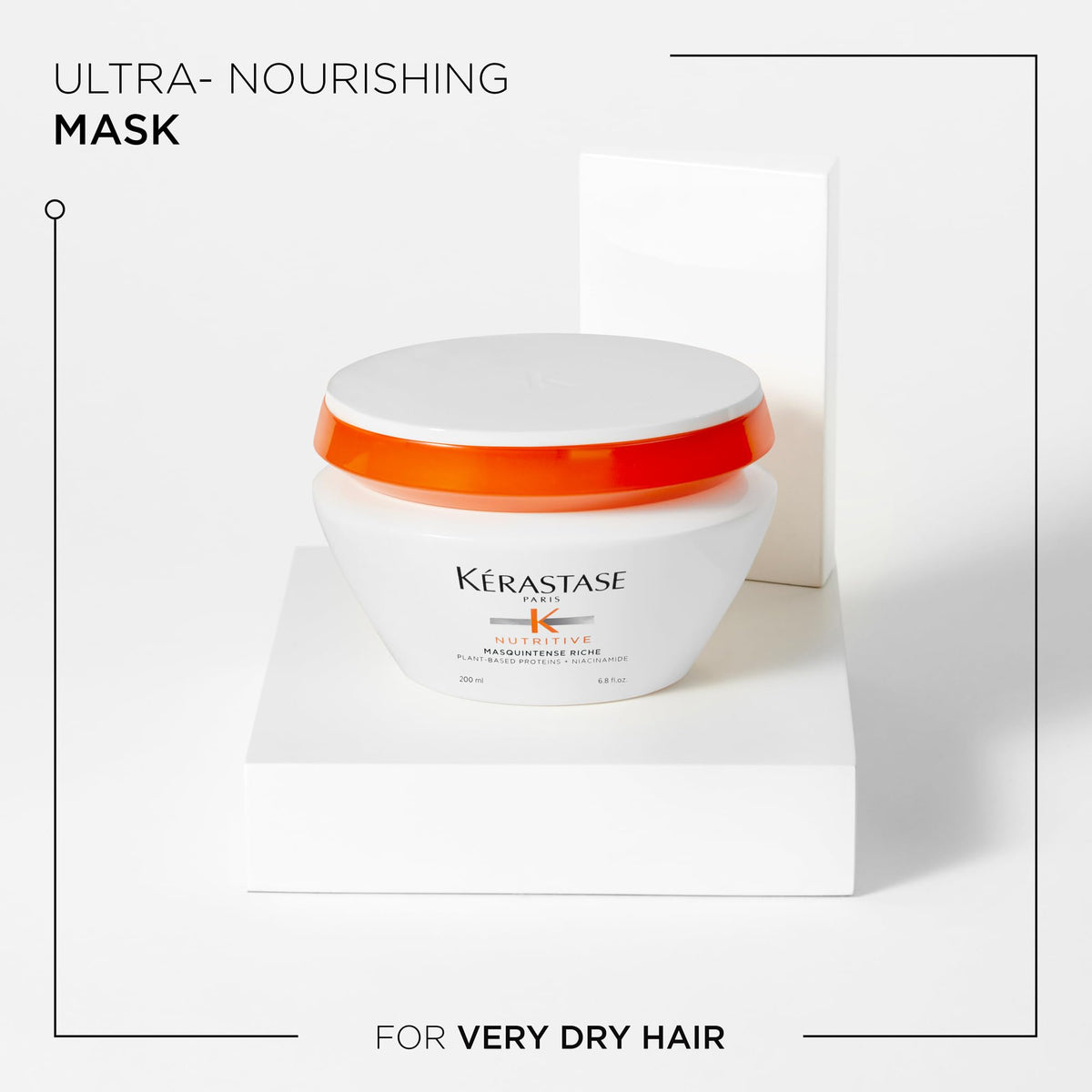 KÉRASTASE cream being scooped to show easy application benefit